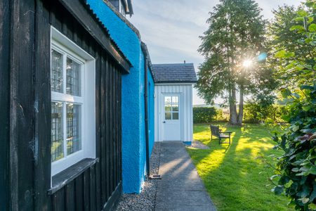 Sunrise at a cottage in Scotlandの写真素材