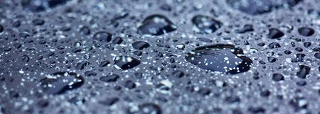 Rain water drops isolated on black background