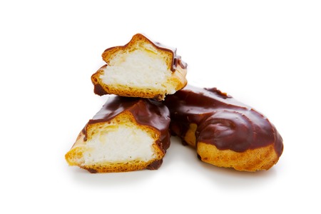 Eclairs with chocolate isolated on white background.