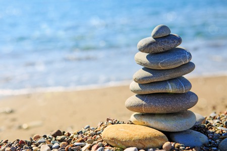 Spa stones balance on beach.の写真素材