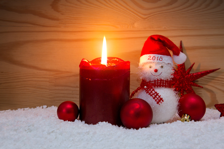 Happy New 2018 Year background with Snowman and Advent candle.の写真素材