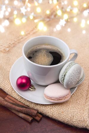 Colorful macaroons and coffee cup. Christmas card.の写真素材