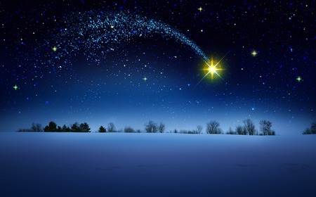 Christmas Star and blue abstract sky.Christmas background.