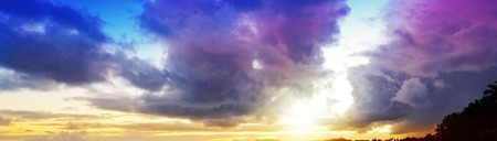 Tropical sunrise with coconut palm trees. Travel background.