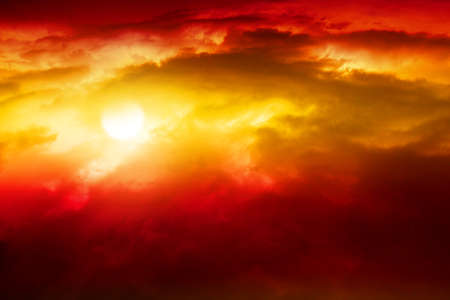 Red sunset light in orange and red color sky with cloudsの写真素材