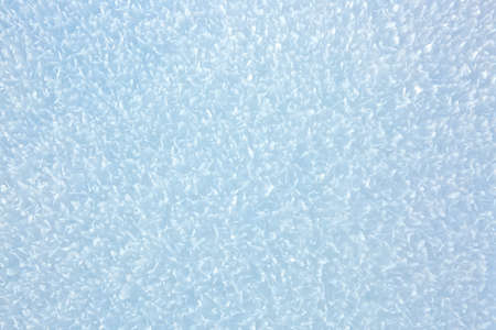 Macro shot from Snow. Christmas abstract background.