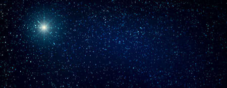 Christmas Star on dark abstract sky. Christmas background.の写真素材