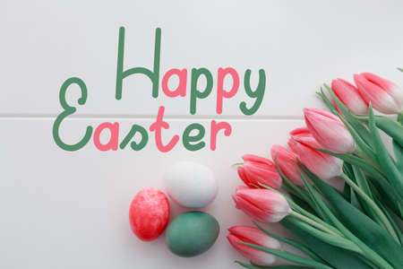 Happy Easter background with colorful eggs on white.の写真素材