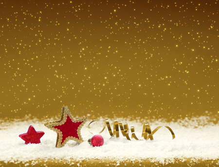 Red Star on white snow isolated on yellow background.の写真素材