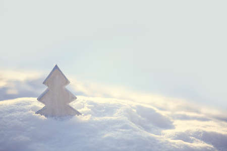 Christmas background with fir tree on white snow.の写真素材