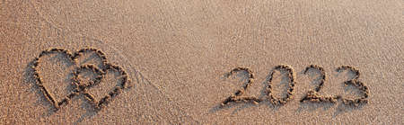 New Year 2023 is coming concept on tropical beach.