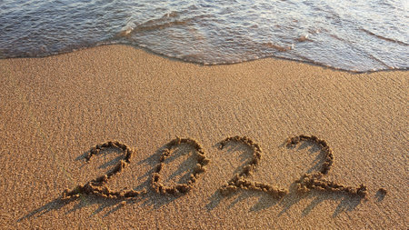 New Year 2022 is coming concept on tropical beach.の写真素材
