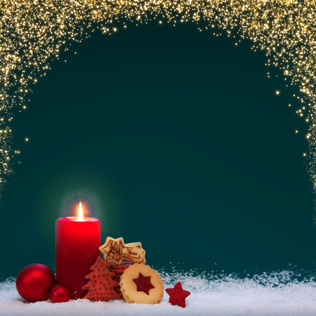Christmas background with Advent candle and red decorationの写真素材