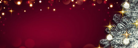 Christmas tree with lights isolated on red background.の写真素材
