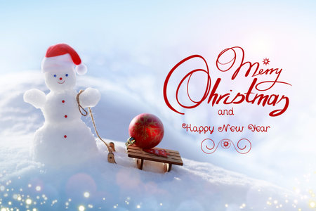 Merry Christmas background with happy snowman and wood sled, stand in white snow.の写真素材