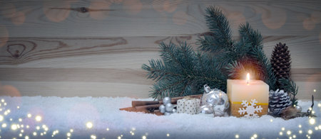 Christmas background with Advent candle and decorationの写真素材