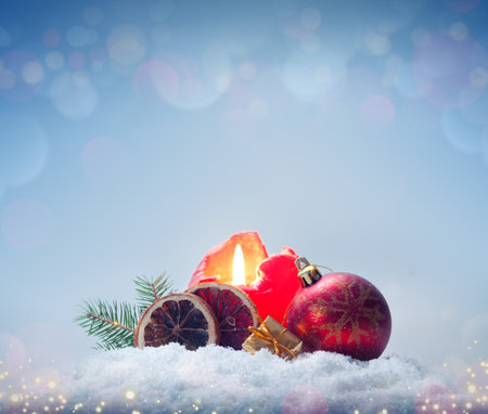 Christmas background with red Advent candle and decorationの写真素材