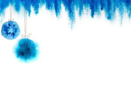 Christmas Balls hanging on a blue abstract watercolor frame.の写真素材