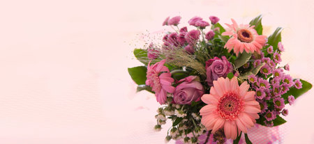 Colorful bouquet of pink flowers isolated on blur background.の写真素材