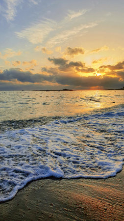 Colorful sunset over the sea waves.Sunset sky over sea.の写真素材