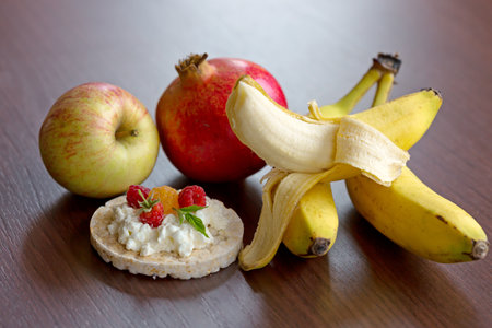Dietary breakfast for summertime with banana, apple and quark.の写真素材