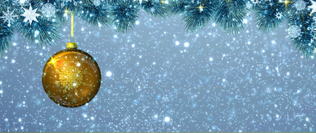 Christmas ball hanging on fir tree branch isolated on gray.の写真素材