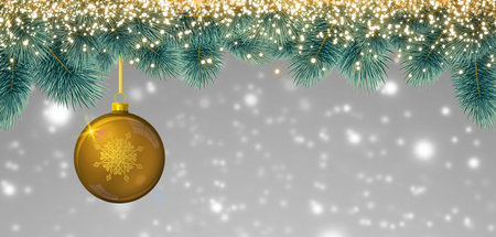 Golden Christmas ball isolated on snow background.の写真素材