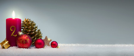 Second Advent background with red candle on white snow.の写真素材