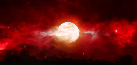 Full moon night sky with abstract clouds and trees.の写真素材