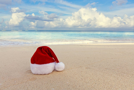 Merry Christmas hat on the white Caribbean sand.の写真素材
