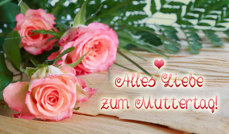 Happy Mothers Day phrase with a pink roses.の写真素材