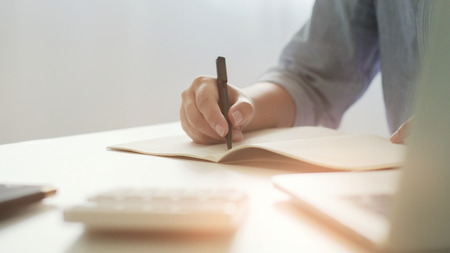 business executive start up analyzing a valuation investment documentsの写真素材