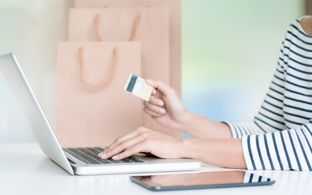Young Woman Shopping Online With Debit / Credit Card, payment and marketing conceptの写真素材