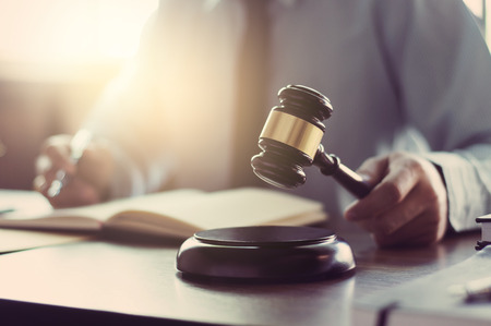 Justice and Law concept. lawyer working at courtroom.