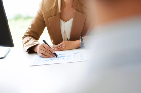 Business executives analysis data document with accountant at workplaceの写真素材