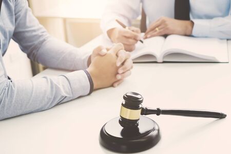 tribunal and justice concept, Consultation with insurance lawyer and customerの写真素材