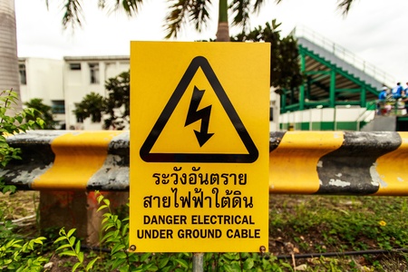 Underground electrical cable warning signの写真素材