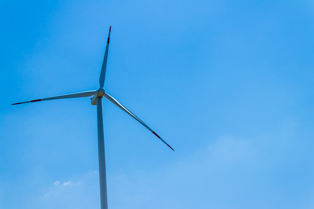 a landscape shoot with windmilll and clean sky. photo has taken from izmir/turkey.の写真素材