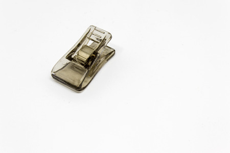 a paper clip with white background. this is isolated object photo.の写真素材