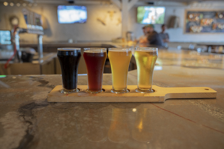 A tasting flight gives a 4oz poor of several beersの写真素材