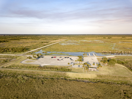 A park has a boat launch and parking area for boaters wanting to use the waterways near the St Johns Riverの写真素材