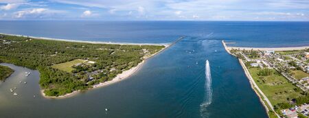 The state park is adjacent to the inlet allowing boaters easy access to the open ocea.の写真素材