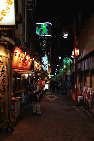 TOKYO - JAPAN - DECEMBER 26, 2015: Small alley with restaurants near Shinjuku, downtown Tokyo.のeditorial素材