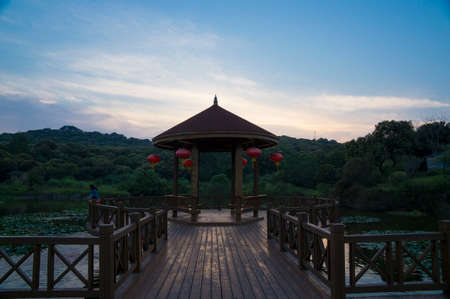 Scenery with pavilion under blue skyの写真素材