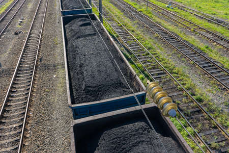 Car with coal at the railway station, view from aboveの写真素材