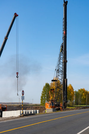 Road works on the M-7 highway, piling machineの写真素材