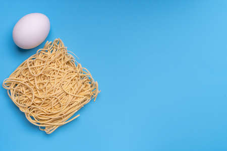 Instant noodles and white chicken eggの写真素材