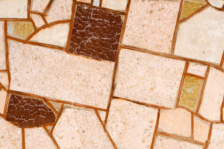 Wall of shards of yellow shell rock tiles, retro backgroundの写真素材