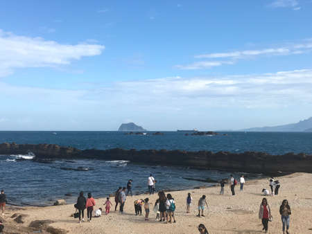 Tourists on the beach in Tenerifeの写真素材