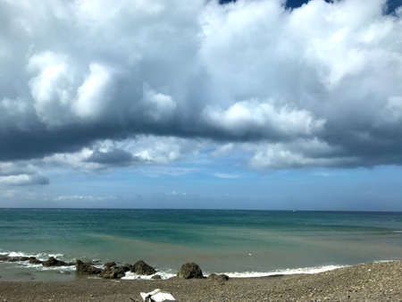 Dramatic cloudscape over the sea. Beautiful seascape.の写真素材